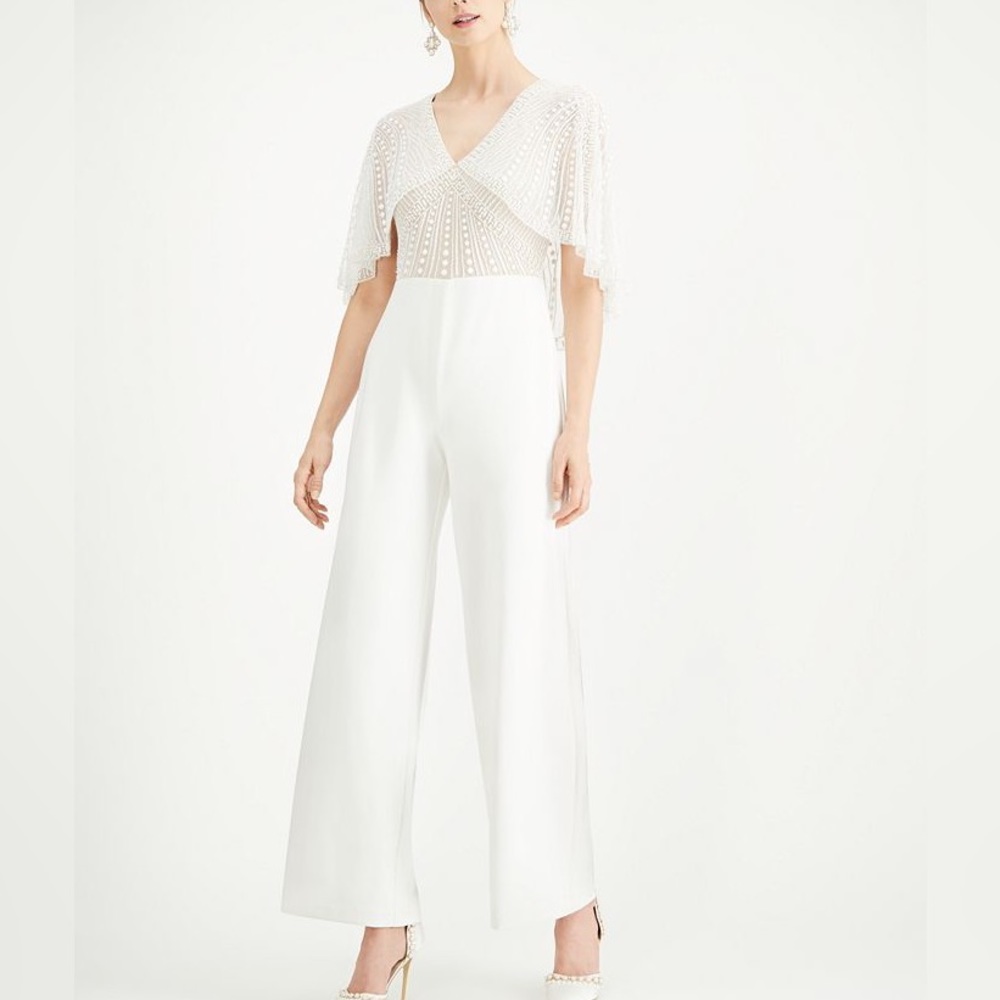 Adrianna Papell Women’s beaded Cape Jumpsuit. Size 12. White and Cream.